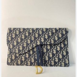 Christian Dior Blue Oblique Jacquard Saddle Pouch featuring a signature gold-finish metal D stirrup