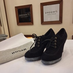 Hogan black suede lace-up ankle boots.