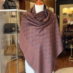 Gucci GG jacquard silk wool shawl in Brown featuring the brand's iconic GG monogram pattern.