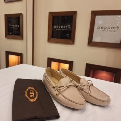 Tod's loafers, likely the Heaven or Gommino model