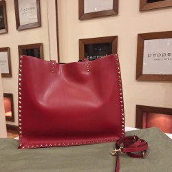 Valentino Garavani Rockstud tote bag in red leather.