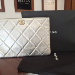 Chanel 19 O-Case clutch crafted from silver quilted leather with gold-tone hardware