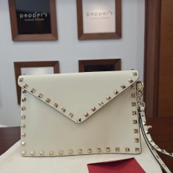 Valentino Rockstud leather clutch bag